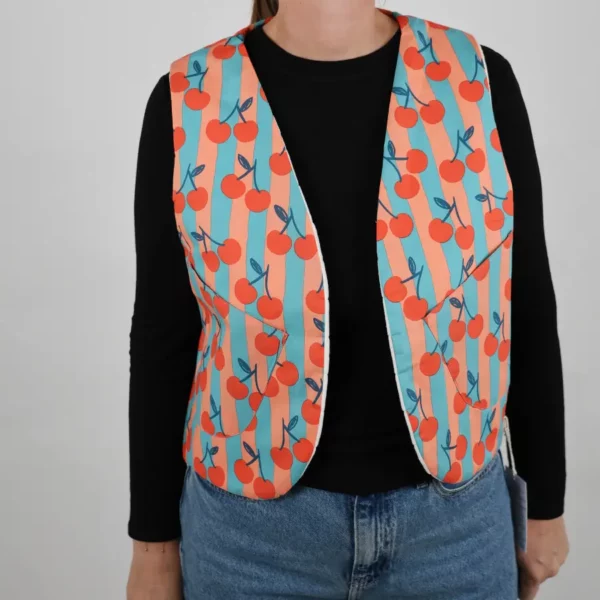 Gilet sans manches unique réversible cerise rayures bleu et pêche